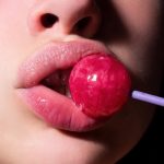 Girl,With,Sexy,Mouth,Eating,Chupa,Chups,Close,Up.,Woman